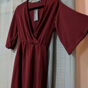 Wine colored wrap dress with bell sleeves